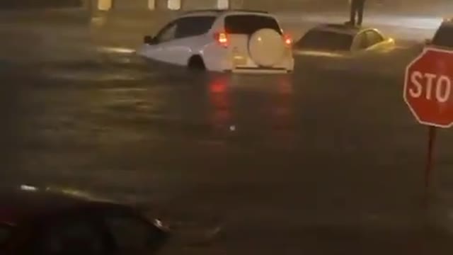 Vehicles literally floating in flood water in Queens, New York City