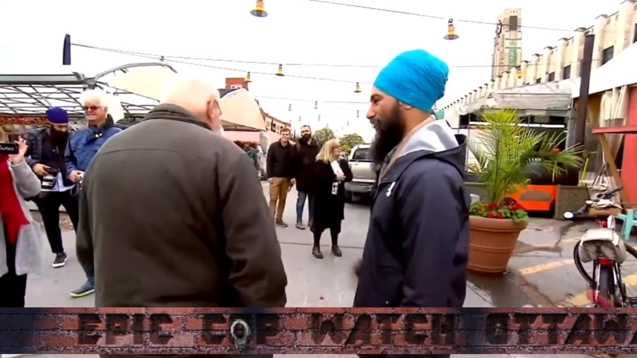 Quebec. man ask him to take his Hjab office had to look more like a Canadian.