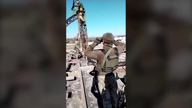 Video shows Ukrainian flag raised in retaken town