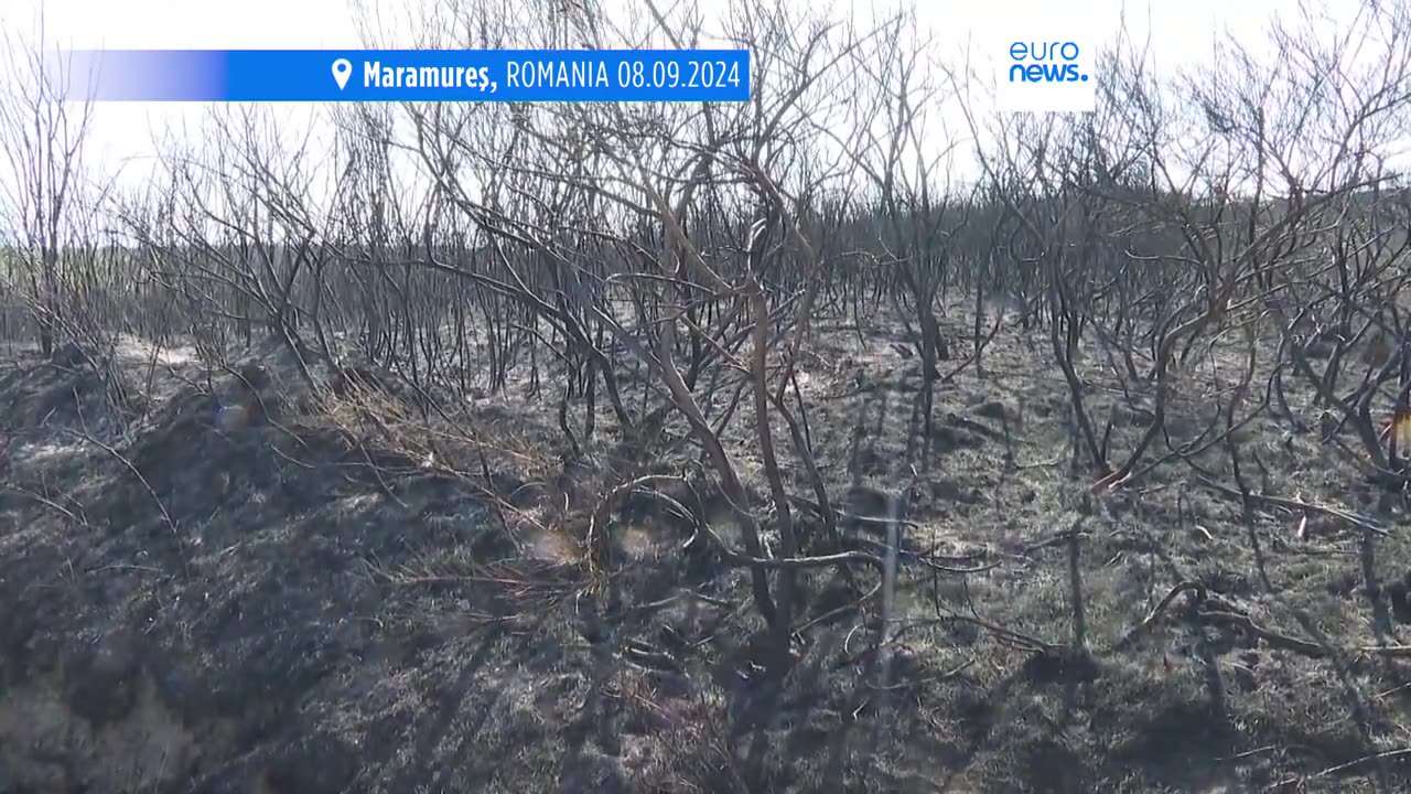 Residents in northern Romania survey damage after massive fire is extinguished