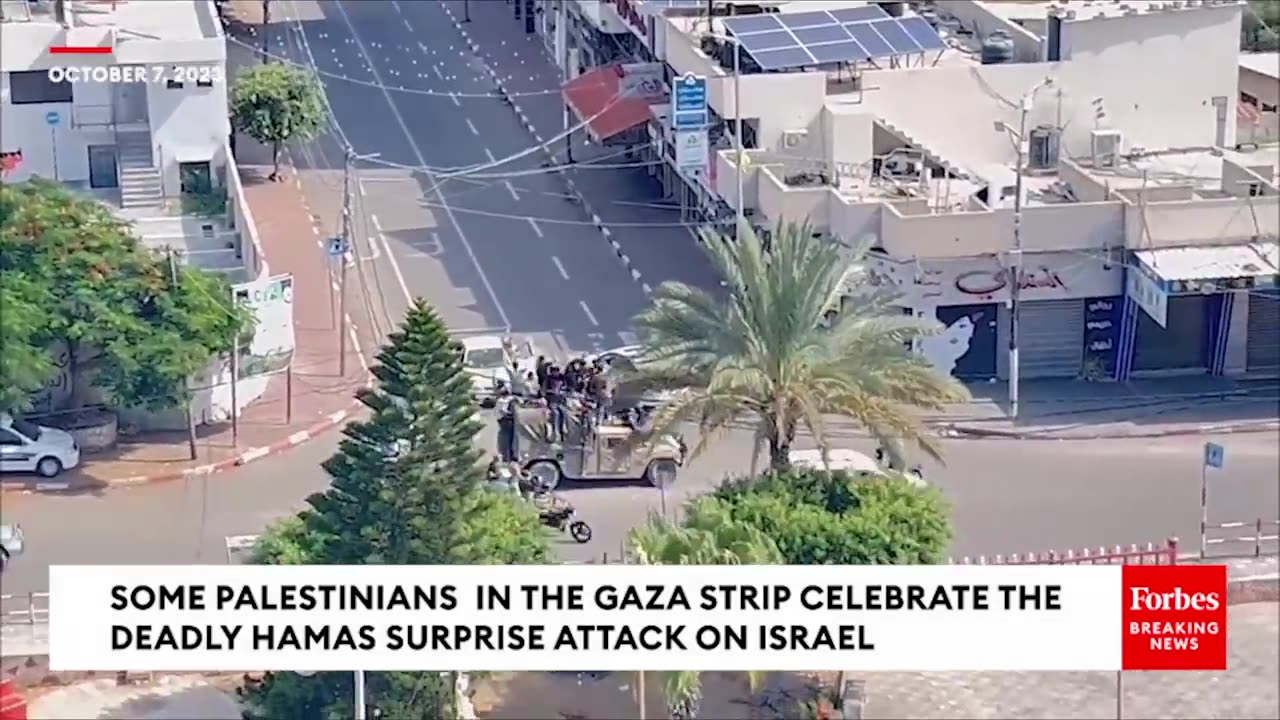 Group Of Palestinians In Gaza Strip Celebrates Hamas Attack On Israel