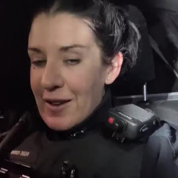 Police officer shows support for anti-vaccine truckers