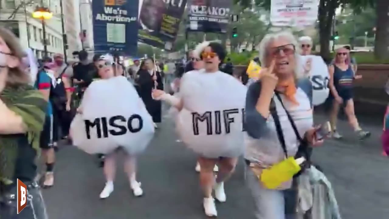 Women Dressed as Abortion Pills March Across Chicago