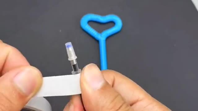 Make a ballpoint pen with a straw