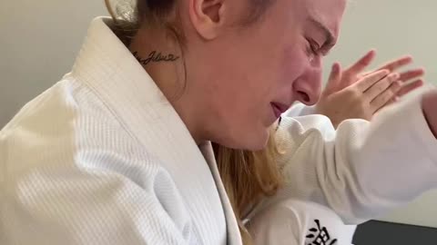 A woman shared reaction upon receiving a black belt in Jiu-Jitsu. Watch the full video inside.