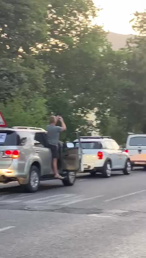 A convoy of security service, volunteers and residents' vehicles honour Yolanda Ackers