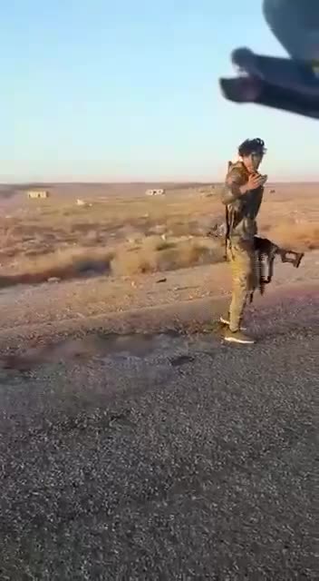 Syrian Arab army forces, along with Iranian militias, comb the Deir ez-Zor desert in search of IS