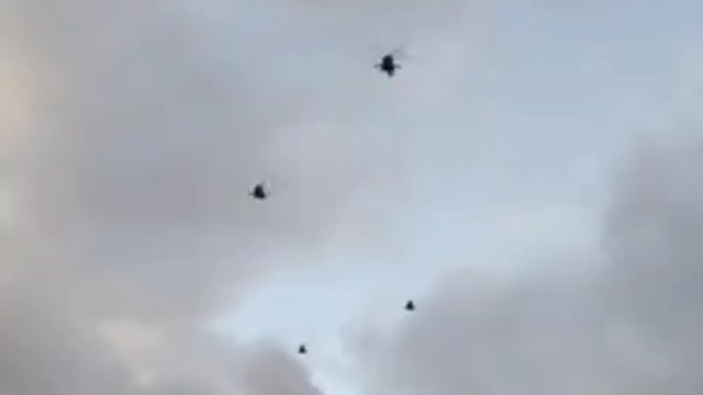 Dozens of attack helicopters make their way into Ukraine