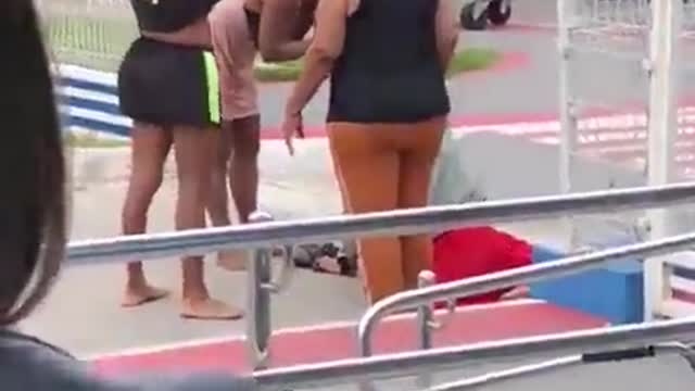 Mothers in Brazil beat the sht out of a man-lady who flashed his junk to their daughter