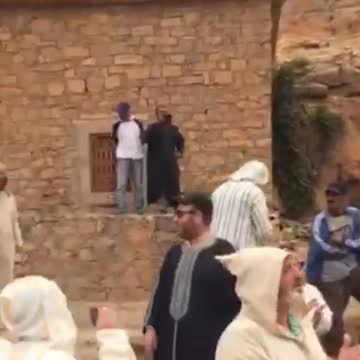 A Lively Scene As Jewish Travellers Sing And Dance In Morocco