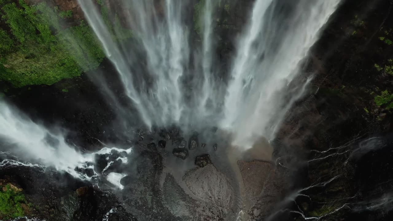 "Aerial Cascade: Serene Waters from Above"