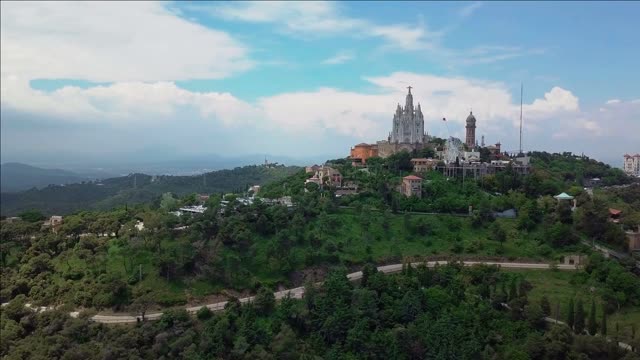 aerial skyline of barcelona from tibidabo mountain