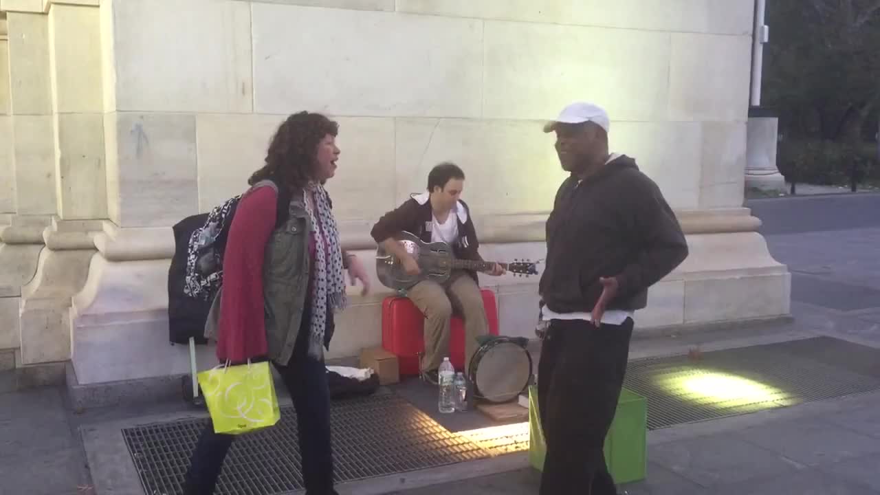 Woman Randomly Walks Off the Street to Join Street Musicians