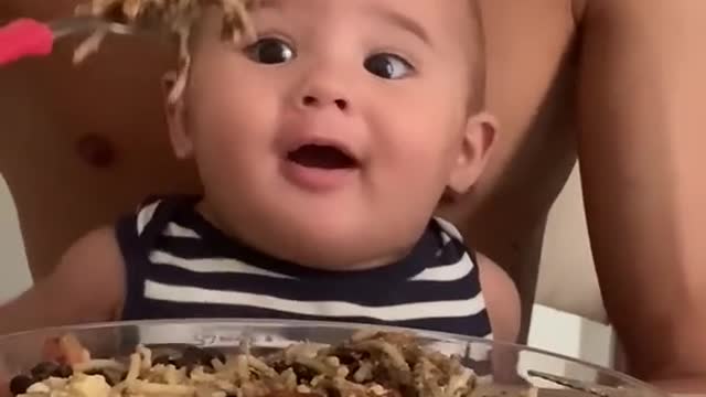 Baby Makes a Grab for Grub