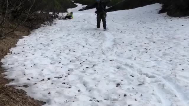 Boot-skiing down a ravine in Alaska