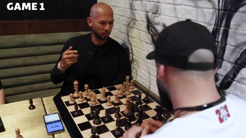 Tate plays chess with stranger