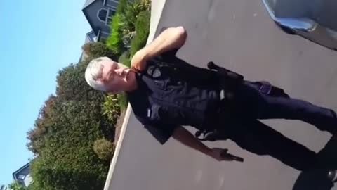 Police Officer confronts citizen and pulls gun out due to man with hands in his pocket