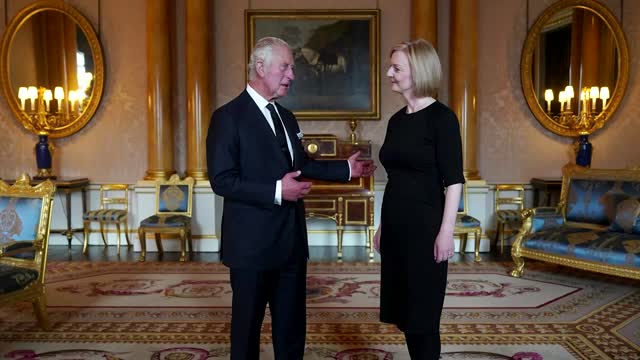 King Charles mutters "dear oh dear" meeting Liz Truss