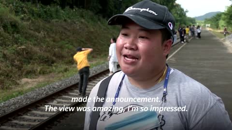 Thailand's 'floating train' a hit as dam waters rise