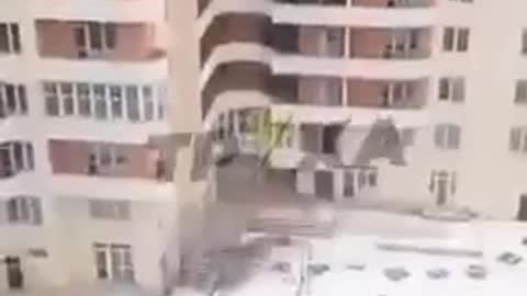 Ukrainians entrench themselves in apartment block