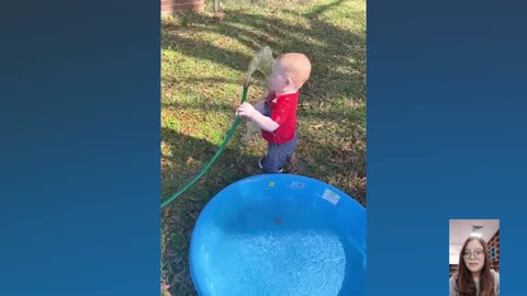 Baby playing with water