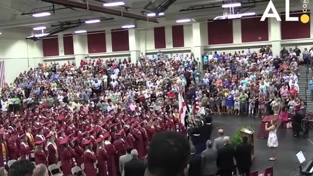 Watch the crowd finish the National Anthem after the mic cuts out