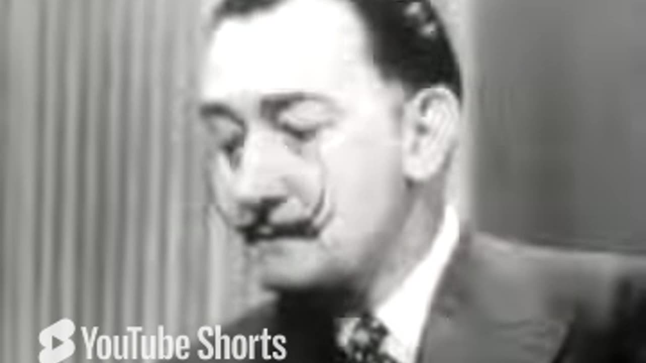 1955, Salvador Dali made a captivating appearance on the Panorama show, alongside Malcolm Muggeridge