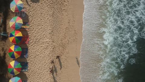 where the sea meets the beach view from a drone