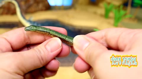Huge Green Black Dinosaur Eat Grass at the Wide Field