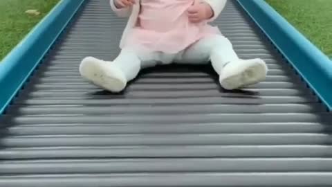 Funny sliding baby