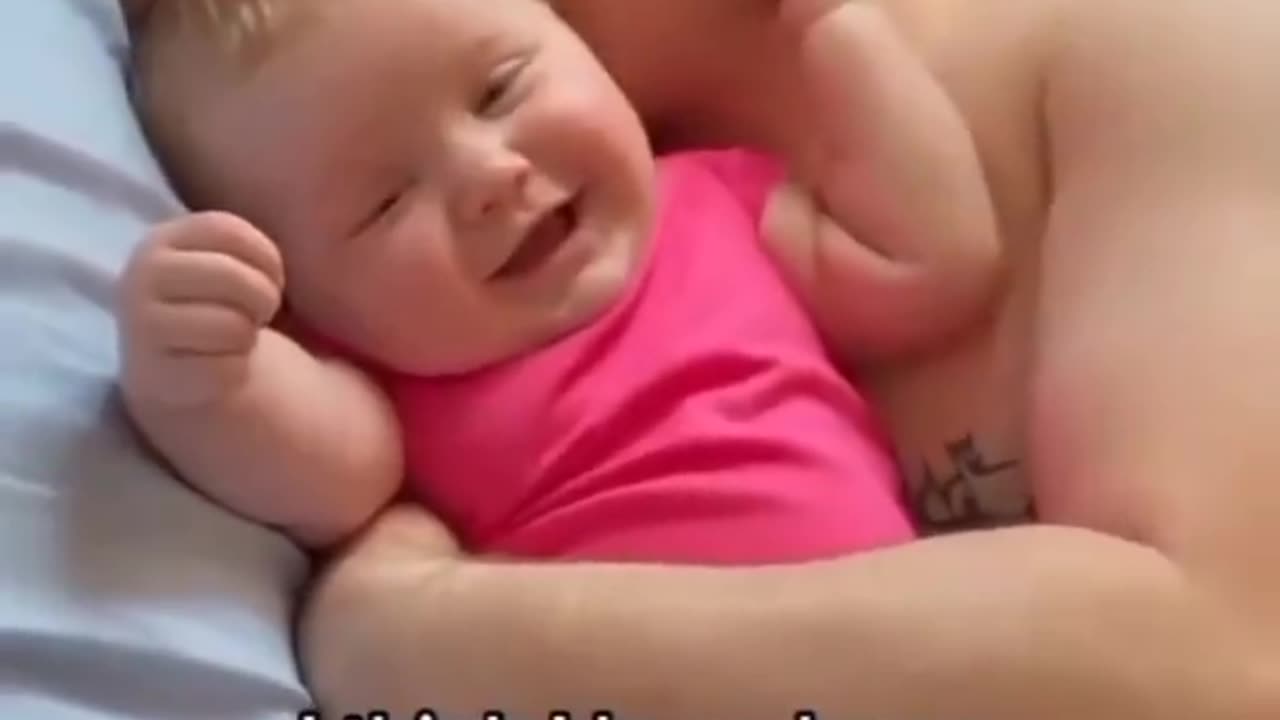 Baby sleeping with dad