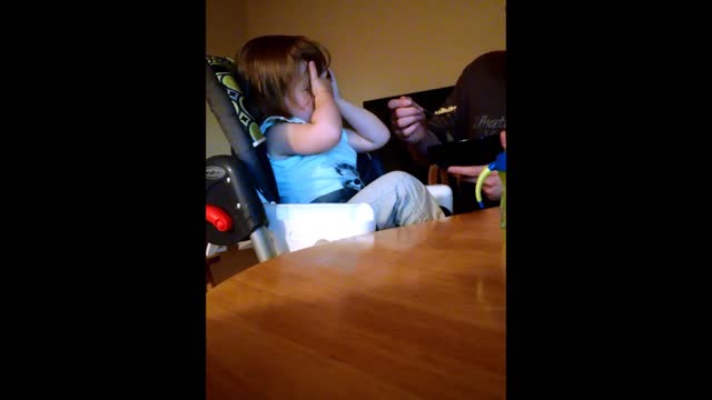 Sassy toddler facepalms dad