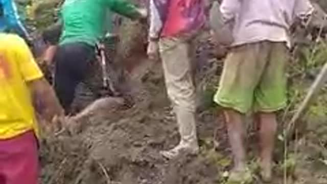 CONSTRUCTION WORKER BRRIED BY LANDSLIDE .