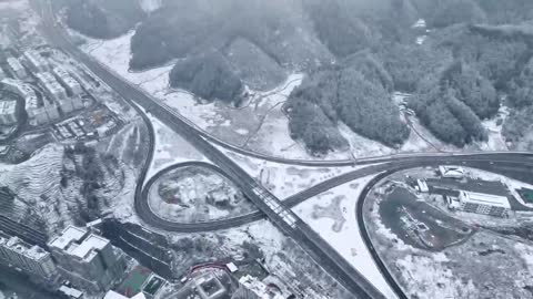 City; Snow scene; river