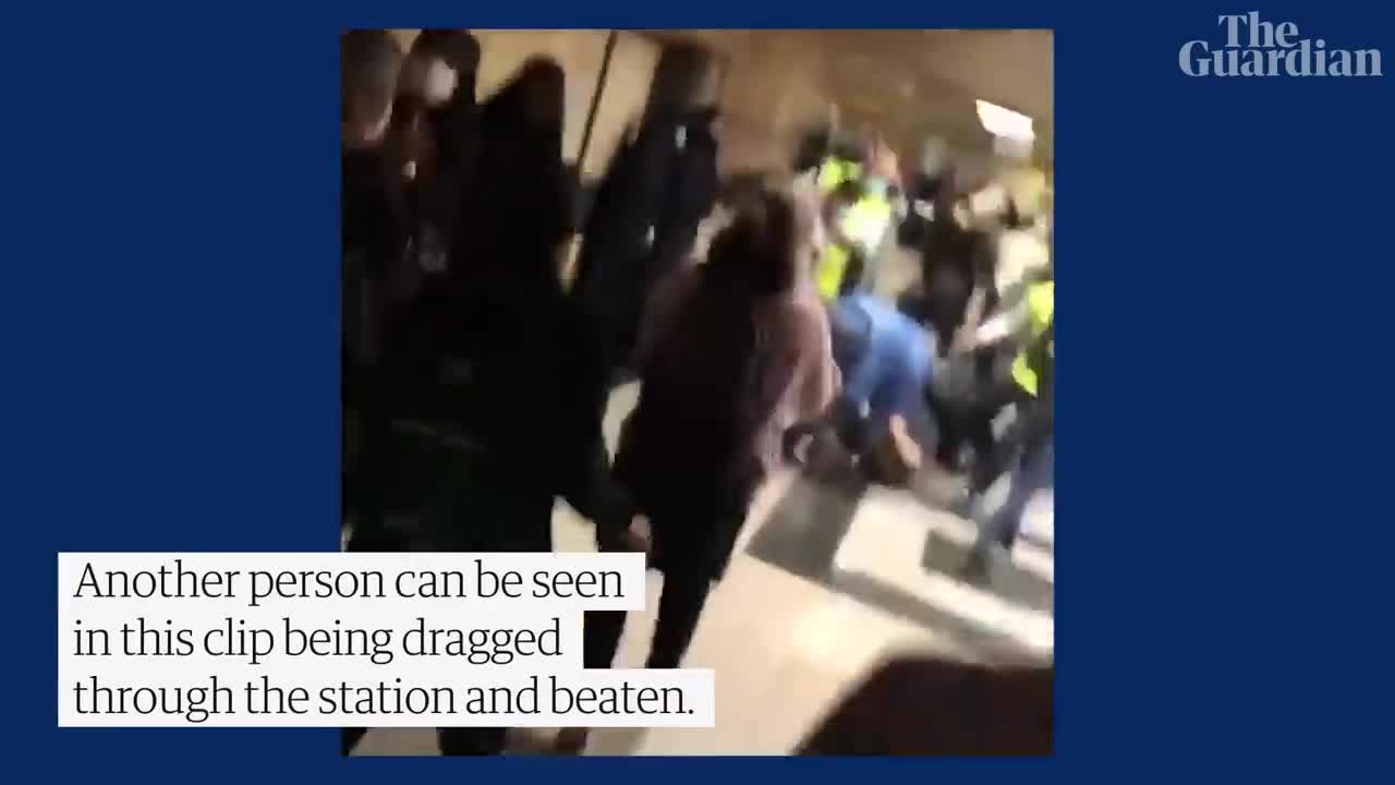 People run for cover as Iranian police open fire during protest at Tehran metro station