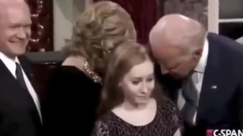 Joe Biden the president of USA touches the breasts of many 10 year old girls