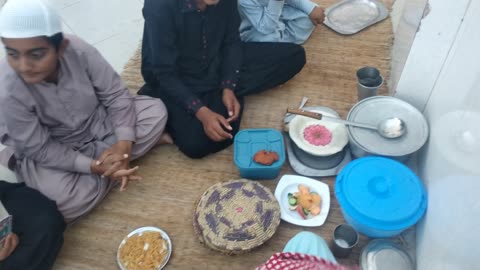 Children's in the Mosque eating the food