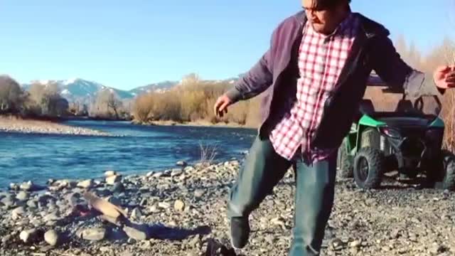 Man Opens Folding Chair By Juggling It With His Leg