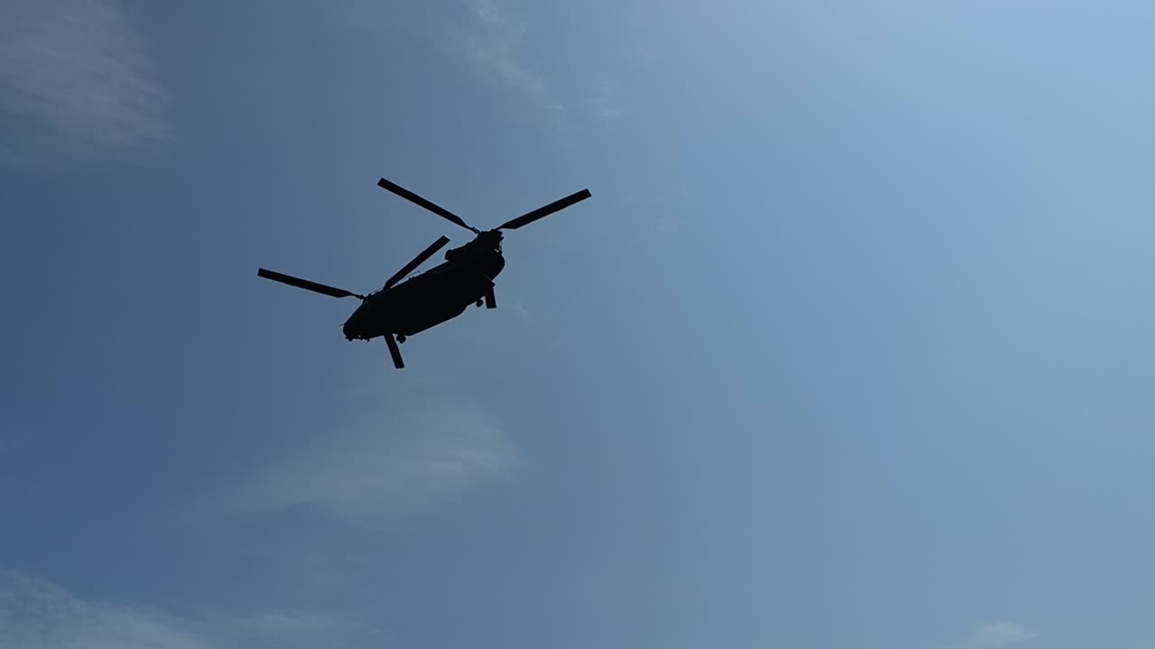 chinook helicopter low flypast, Lyme Regis to Charmouth Dorset UK