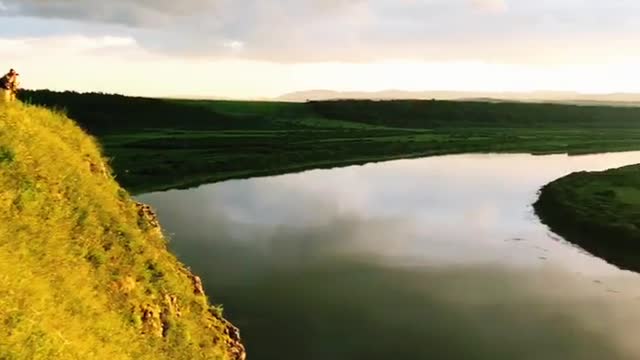 Wow, let's watch the sunset on the grassland together!