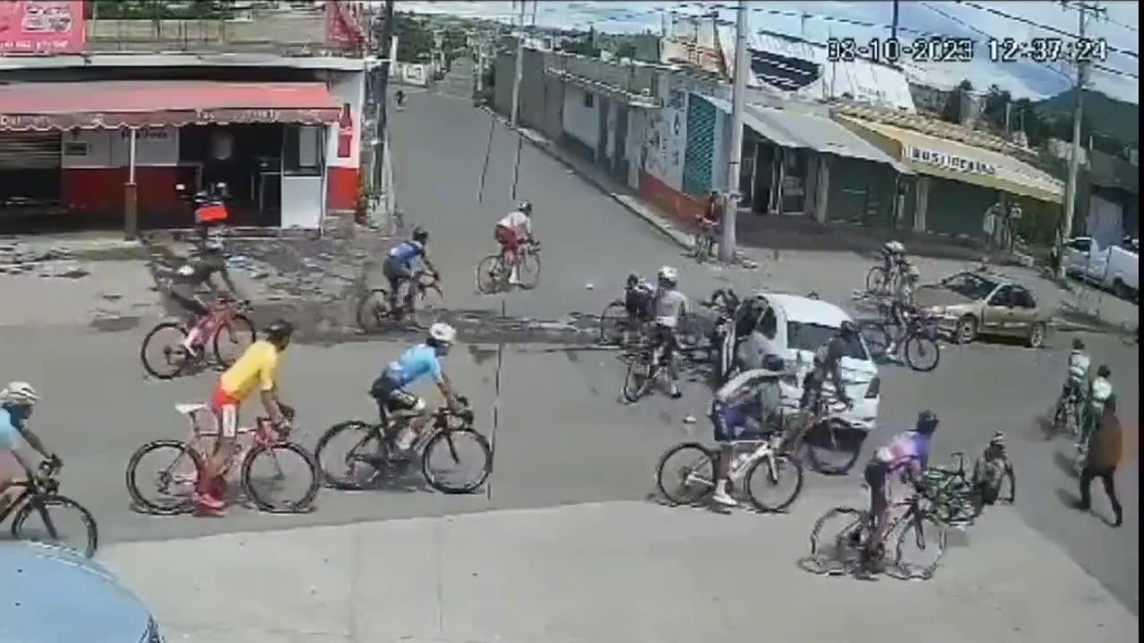 Car interrupts cycling race