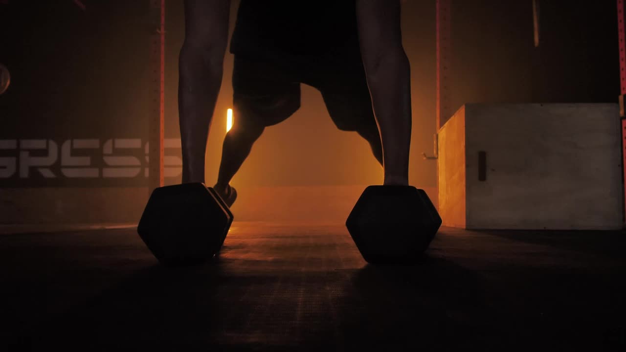 How to do push ups using dumbbells