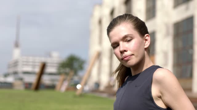 Woman doing exercises outdoors