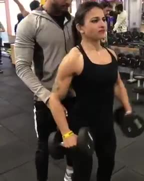 fitness trainer train to a women