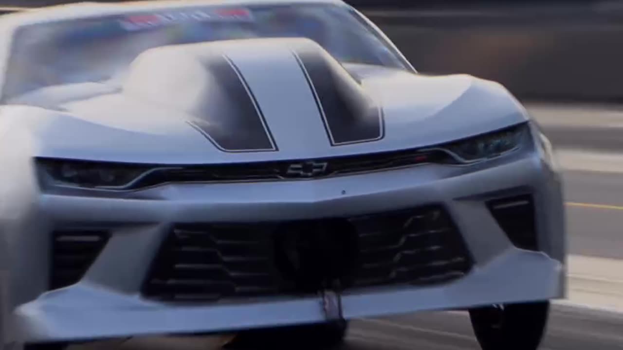 Camaro launches down track