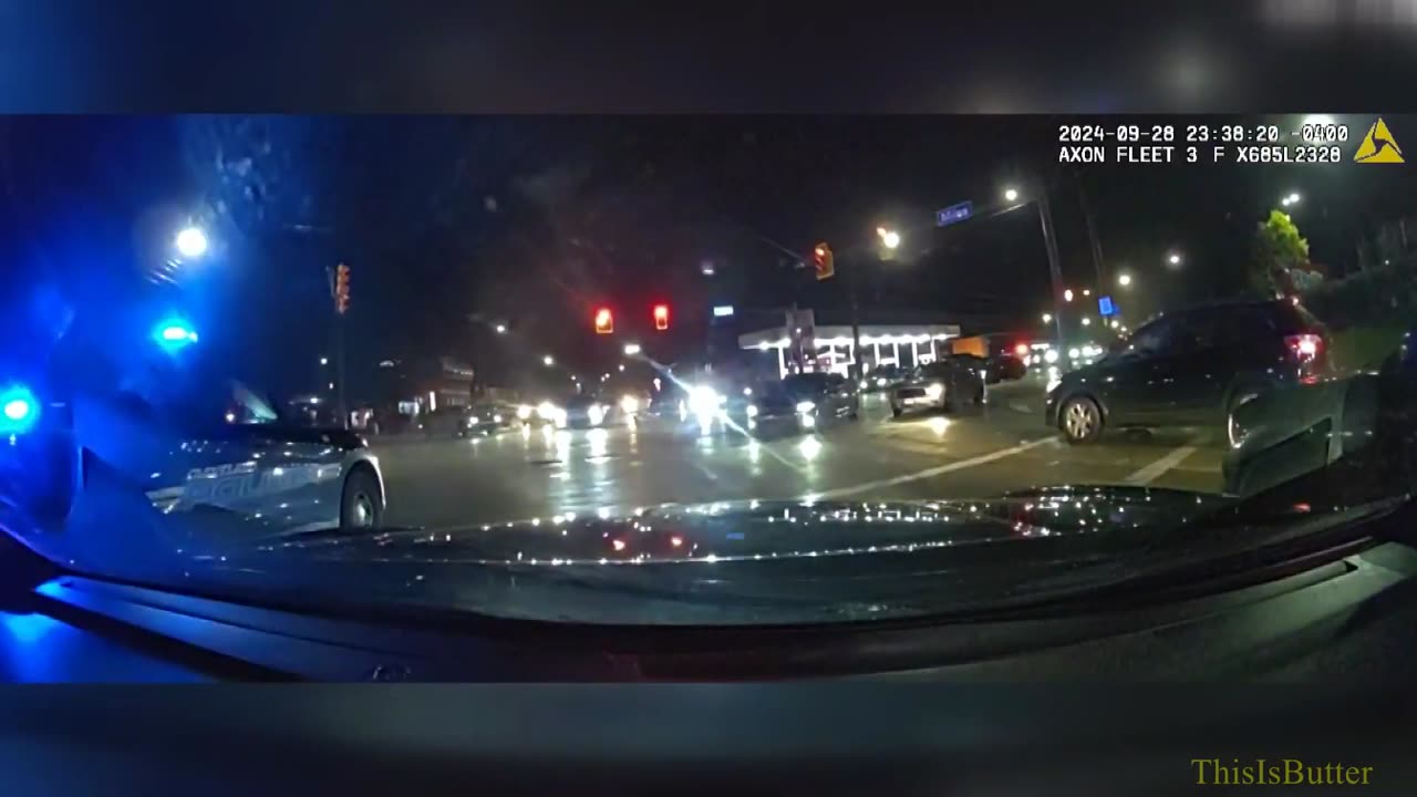 Dashcam shows street takeover crowd swarms police car with officer inside