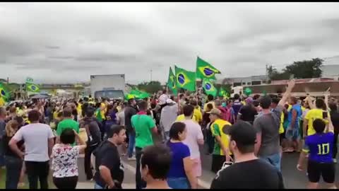 In Brazil, a car crashed into a crowd of protesters footage from the spot