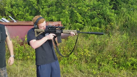 Sean shooting the POF suppressed AR