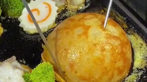 Seafood-loaded takoyaki: A Japanese street food masterpiece! 🐙🦑🦐 #StreetFoodGoals