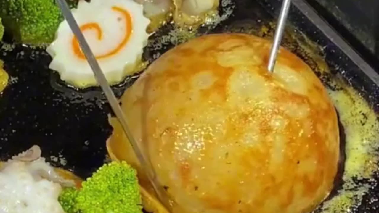 Seafood-loaded takoyaki: A Japanese street food masterpiece! 🐙🦑🦐 #StreetFoodGoals